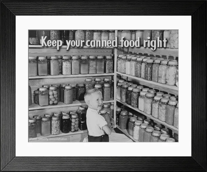 Framed Print : Canned food, caption: No hungry days ahead for this chap. His mother canned all the food her canning plan called for