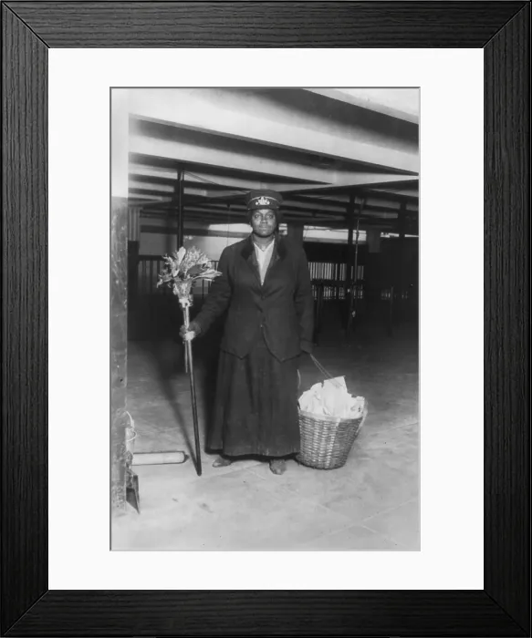 Framed Print : New York City, African American woman porter posed with cleaning gear, subway worker standing, New York, photograph, 1917
