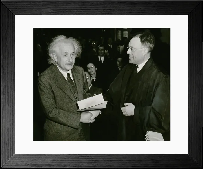 Framed Print : Albert Einstein (1879-1955), receiving his certificate of American citizenship. Einstein left his native Germany after the Nazis came to power in 1933 Framed Print : Albert Einstein (1879-1955), receiving his certificate of American citizenship. Einstein left his native Germany after the Nazis came to power in 1933