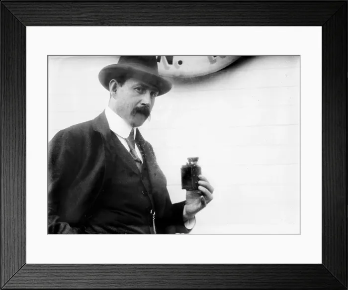 Framed Print : German scientist with a detective camera, circa 1910s