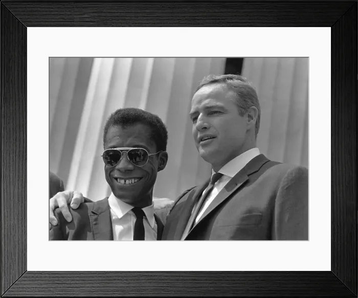 Framed Print : Author James Baldwin and actor Marlon Brando at the 1963 Civil Rights March on Washington. Aug. 28, 1963