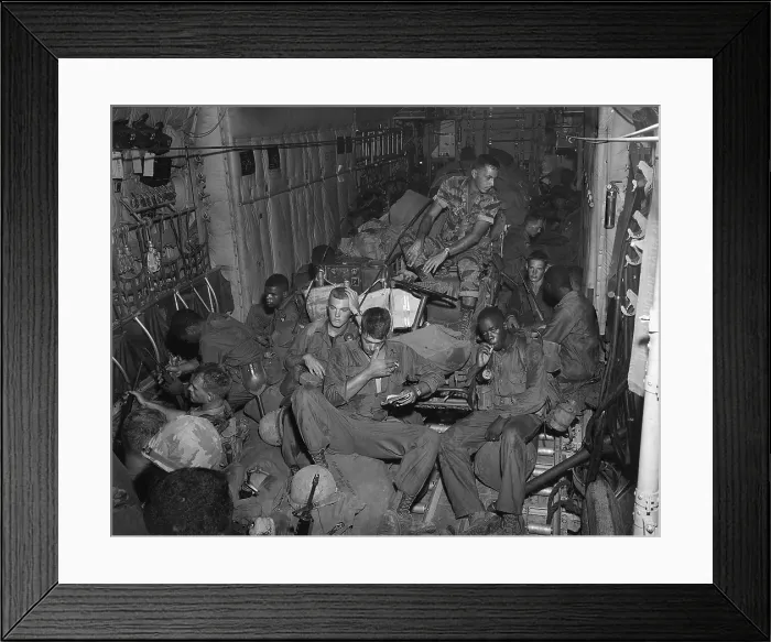 Framed Print : Vietnam War. 101st Airborne Division soldiers an a helicopter enroute to Phi Troung Air Base for a search and destroy mission during Operation Austin. April-May 1966