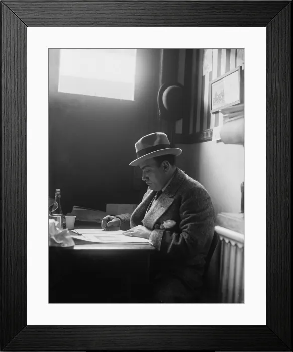 Framed Print : Enrico Caruso (1873-1921) reading in a New York City restaurant. Ca. 1915 Framed Print : Enrico Caruso (1873-1921) reading in a New York City restaurant. Ca. 1915
