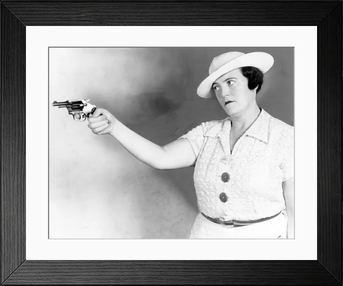 Framed Print : Mary A. Shanley, New York City detective, holding service revolver