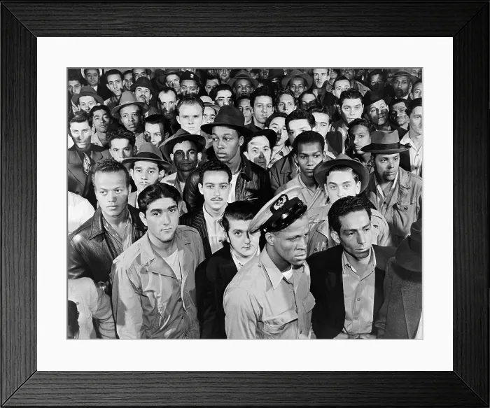 Framed Print : Sailors in the National Maritime Union hiring hall for deck and engine hands, watching the board where the jobs are posted. New York, ca. 1955