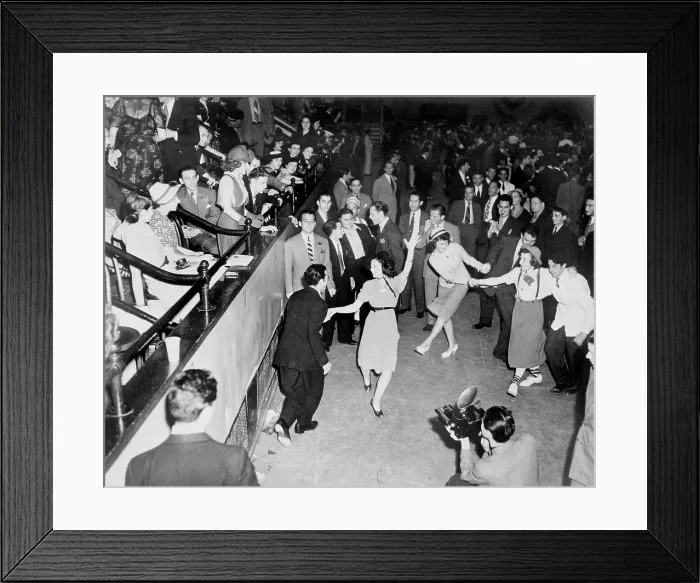 Framed Print : Couples jitterbug dancing on a dance floor, with a photographer in the foreground and the audience in raised seating on the left, photograph by Alan Fisher, 1938 Framed Print : Couples jitterbug dancing on a dance floor, with a photographer in the foreground and the audience in raised seating on the left, photograph by Alan Fisher, 1938