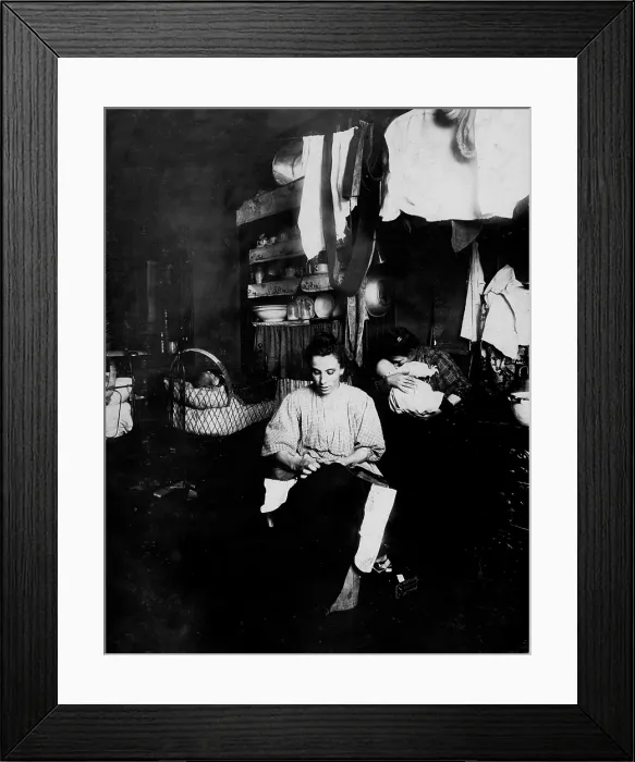 Framed Print : Woman sewing pants, Mrs