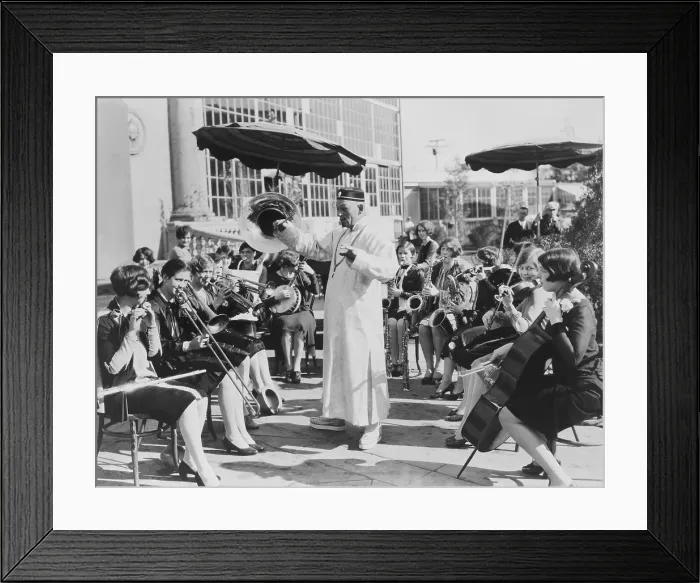 Framed Print : Lon Chaney, as Mr. Wu, conducts All-girl's band that suppli es music for MR WU film. 1927. es music for MR WU film. 1927. es music for MR WU film. 1927