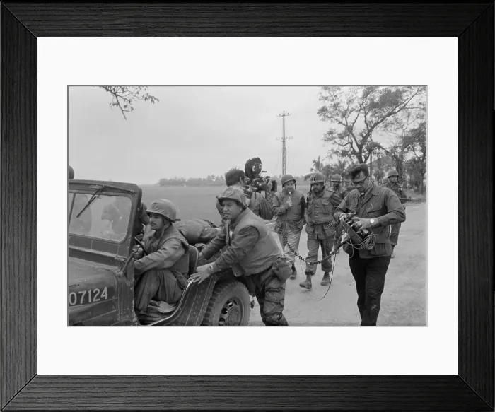 Framed Print : Vietnam War-Tet Offensive. Walter Cronkite (in mid-ground with microphone) interviews the commanding officer of the 1st Battalion, 1st Marines, during the Battle of Hue City Framed Print : Vietnam War-Tet Offensive. Walter Cronkite (in mid-ground with microphone) interviews the commanding officer of the 1st Battalion, 1st Marines, during the Battle of Hue City