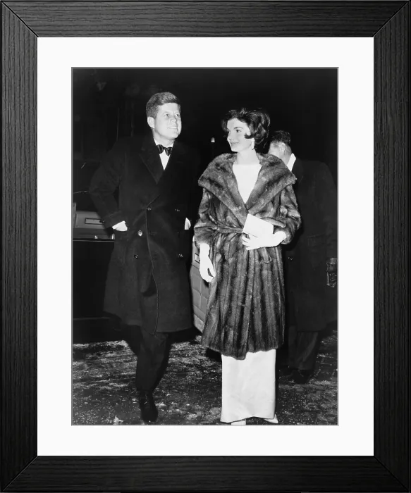 Framed Print : President and Mrs. Kennedy en route to a private party on March 7, 1961. On the cold winter night, Jacqueline Kennedy wears a mink coat