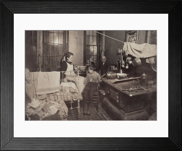 Framed Print : Child abuse, from caption: Jimmie Chinquanana, 11 Hamilton Street, In dark, inner room of his home, in the rear of their store. He is the ninth child, six of whom are dead
