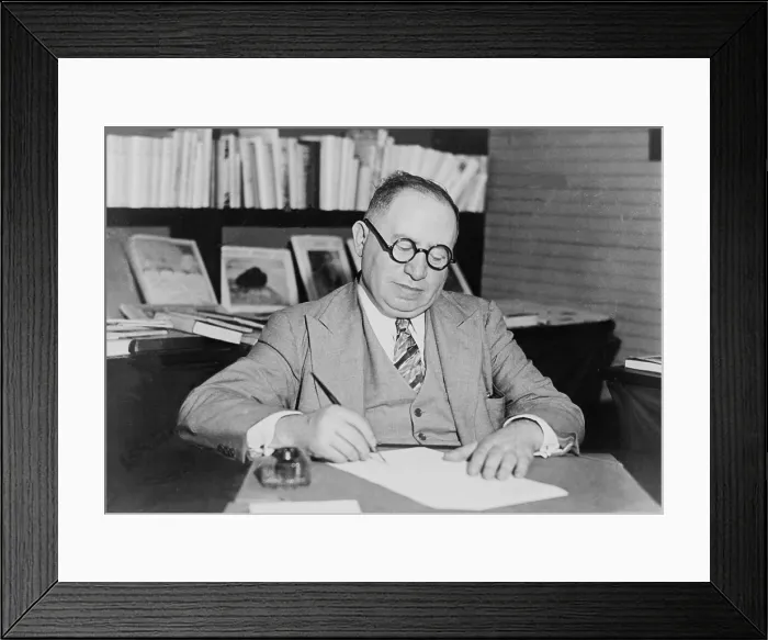 Framed Print : Izzy Einstein (1880-1938) signing contract for his memoirs in 1932 Framed Print : Izzy Einstein (1880-1938) signing contract for his memoirs in 1932