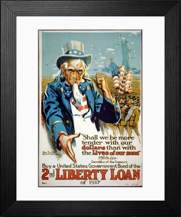 Framed Print : World War I, Poster showing Uncle Sam gesturing towards troops, ships, and planes around the Statue of Liberty, 1917