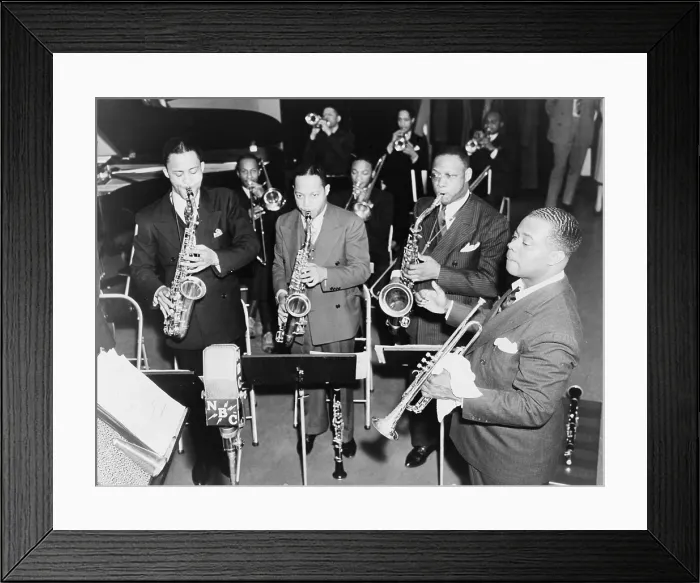 Framed Print : Louis Armstrong (1901-1971), African American Jazz musician, conducting his band during a radio broadcast in 1937 Framed Print : Louis Armstrong (1901-1971), African American Jazz musician, conducting his band during a radio broadcast in 1937