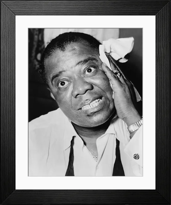 Framed Print : Louis Armstrong (1901-1971), African American Jazz musician, with his signature handkerchief in 1953