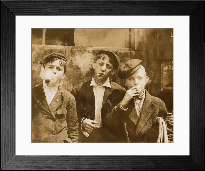 Framed Print : Boys smoking, original caption: A.M. Monday, newsies at Skeeter's branch They were all smoking. St. Louis, Missouri, photograph by Lewis Wickes Hine, May 9, 1910