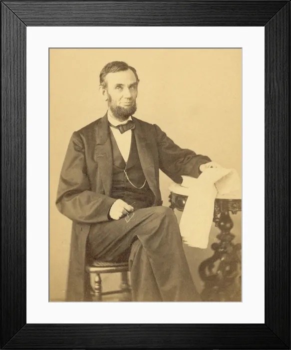 Framed Print : President Abraham Lincoln (1809-1865) is close to a smile in this August 1863 portrait by Alexander Gardner (1821-1882)