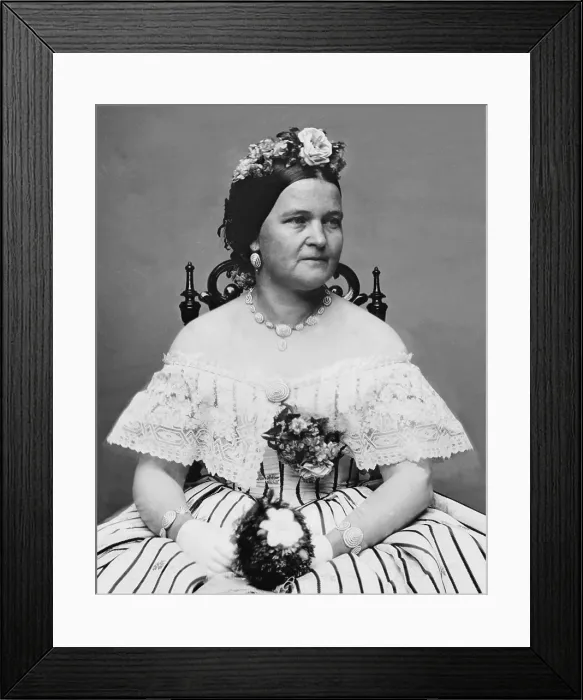 Framed Print : Mary Todd Lincoln (1818-1882), wife of Abraham Lincoln, in a ball gown and flowers in her hair. She was both admired and criticized for her stylish extravagance