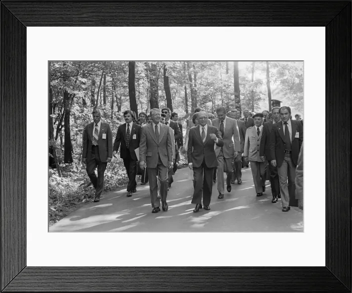 Framed Print : Jimmy Carter Menahem Begin and Israeli delegation stroll within Camp David. The delegation was critical to the success of the summit negotiations. Sept 5-17 1978 Framed Print : Jimmy Carter Menahem Begin and Israeli delegation stroll within Camp David. The delegation was critical to the success of the summit negotiations. Sept 5-17 1978