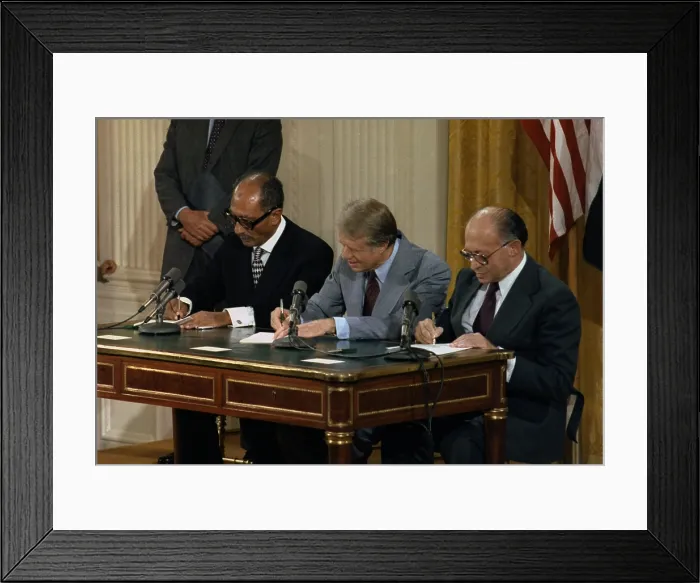 Framed Print : Anwar Sadat Jimmy Carter and Menahem Begin at the Camp David Accords signing ceremony which lead to a Peace treaty between Egypt and Israel. Sept. 17 1978