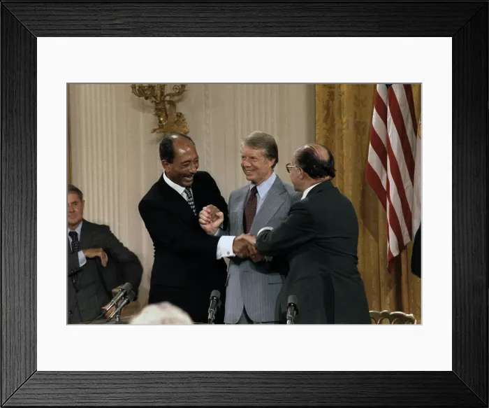 Framed Print : Anwar Sadat Jimmy Carter and Menahem Begin at the Camp David Accords signing ceremony which lead to a Peace treaty between Egypt and Israel. Sept. 17 1978