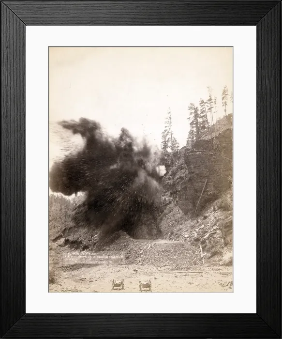 Framed Print : In mid air. A wonderful blast in building railroad to Deadwood. Dakota Territory. photo by John C. Grabill, 1887