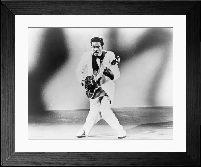 Framed Print : Chuck Berry (b. 1926) playing guitar. Berry created classic Rock n Roll numbers ROLL OVER BEETHOVAN and ROCK AND ROLL MUSIC. 1957
