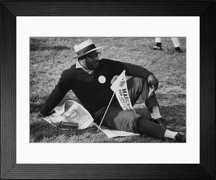 Framed Print : 1963 March on Washington. A male marcher relaxing on the grass of the Capitol Mall. Aug. 28, 1963 Framed Print : 1963 March on Washington. A male marcher relaxing on the grass of the Capitol Mall. Aug. 28, 1963
