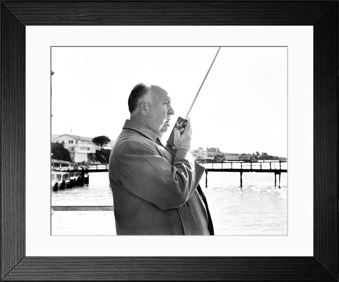 Framed Print : THE BIRDS, director Alfred Hitchcock, on location in Bodega Bay, California, 1963