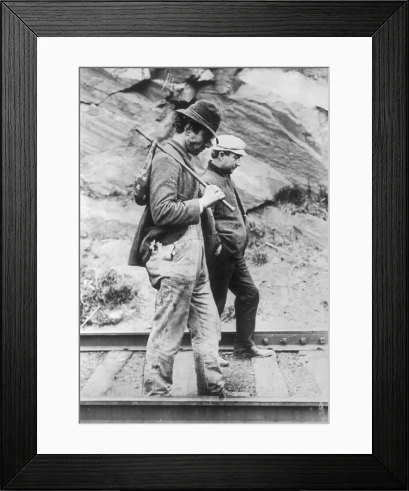 Framed Print : Two hobos walking along railroad tracks, after being put off a train, photograph, circa 1910s-1930s Framed Print : Two hobos walking along railroad tracks, after being put off a train, photograph, circa 1910s-1930s