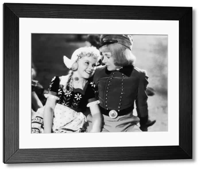 Framed Print : HEIDI, Shirley Temple, Delmar Watson, 1937, TM and copyright 20th Century Fox Film Corp. All rights reserved  /  Courtesy: Everett Collection