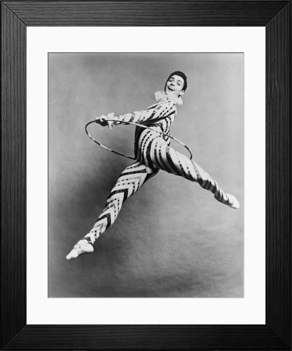 Framed Print : Edward Villella (b. 1936), in mid-air leap, in his role as the Peppermint Stick in Tchaikovsky's THE NUTCRACKER as performed by the New York City Ballet at City Center. 1960