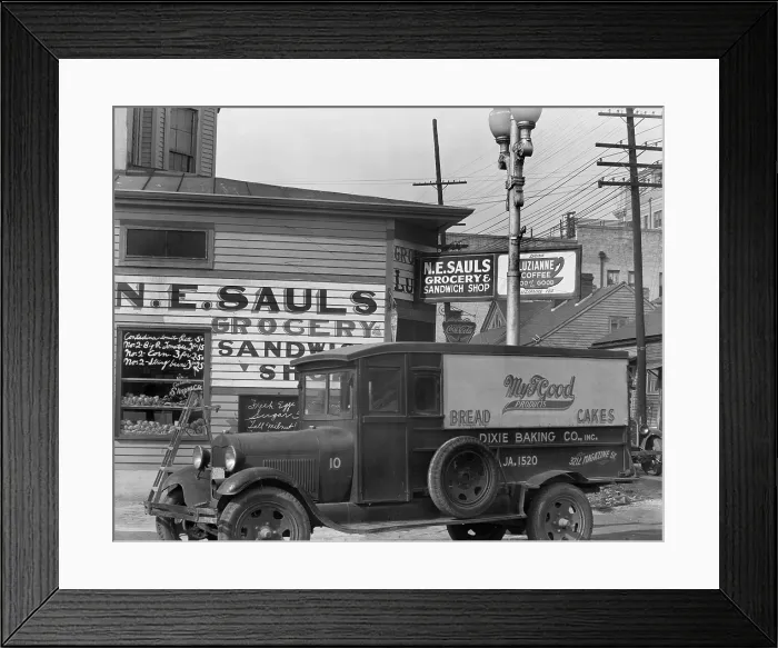 Framed Print : New Orleans street corner, My T Good bakery truck in foreground, Louisiana, photograph by Walker Evans, August, 1936