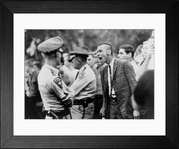 Framed Print : A White student shouts insults at United States marshals enforcing federal orders to protect James Meredith as he registers for classes at the University of Mississippi. Sept Framed Print : A White student shouts insults at United States marshals enforcing federal orders to protect James Meredith as he registers for classes at the University of Mississippi. Sept