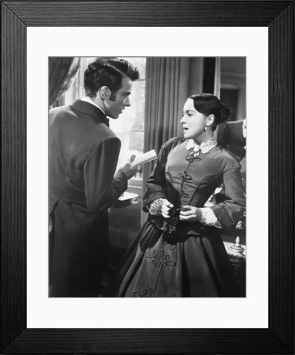 Framed Print : THE HEIRESS, from left, Montgomery Clift, Olivia De Havilland, 1949
