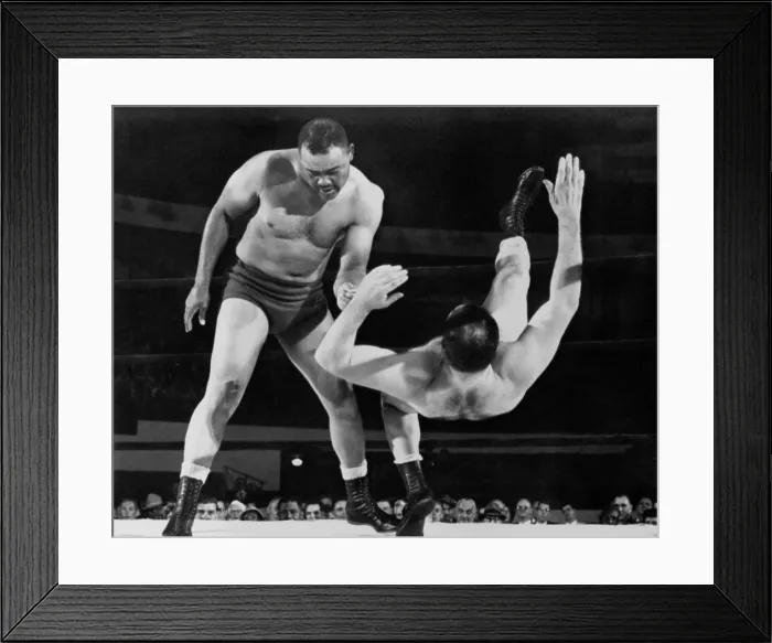 Framed Print : Joe Louis throws Jim Bernard to the mat during a 1956 wrestling match at Olympia Stadium in Detroit