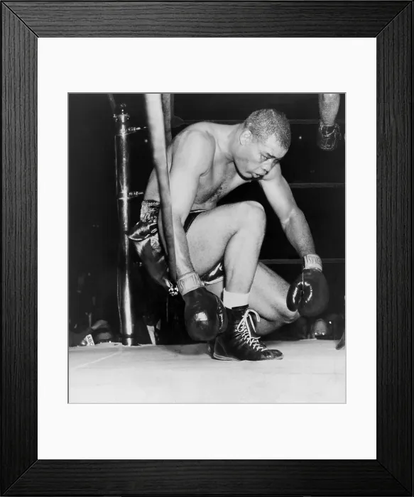Framed Print : Joe Louis last professional boxing fight. He sinks through the ropes in an eighth-round knockout by Rocky Marciano in Madison Square Garden. Oct. 27, 1951