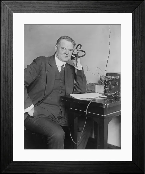 Framed Print : Sec. of Commerce Herbert Hoover (1874-1964) listening to radio with headphones in 1925. Commercial radio broadcasts began in the 1920s Framed Print : Sec. of Commerce Herbert Hoover (1874-1964) listening to radio with headphones in 1925. Commercial radio broadcasts began in the 1920s