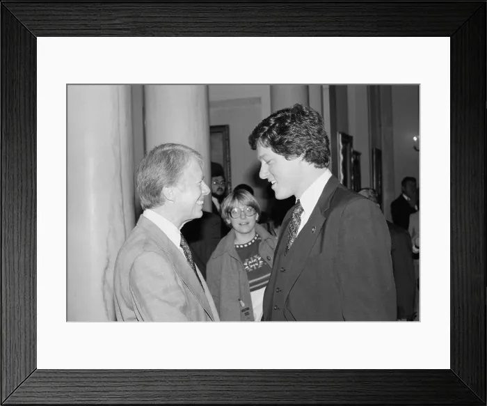 Framed Print : President Jimmy Carter with future President Bill Clinton. During the Carter presidency Clinton was elected Arkansas Governor at the age of 33. Ca. 1979