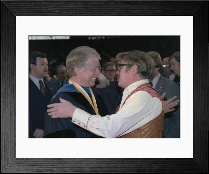 Framed Print : Jimmy Carter greets his brother Billy Carter at the commencement ceremonies at Georgia Institute of Technology in Atlanta Georgia