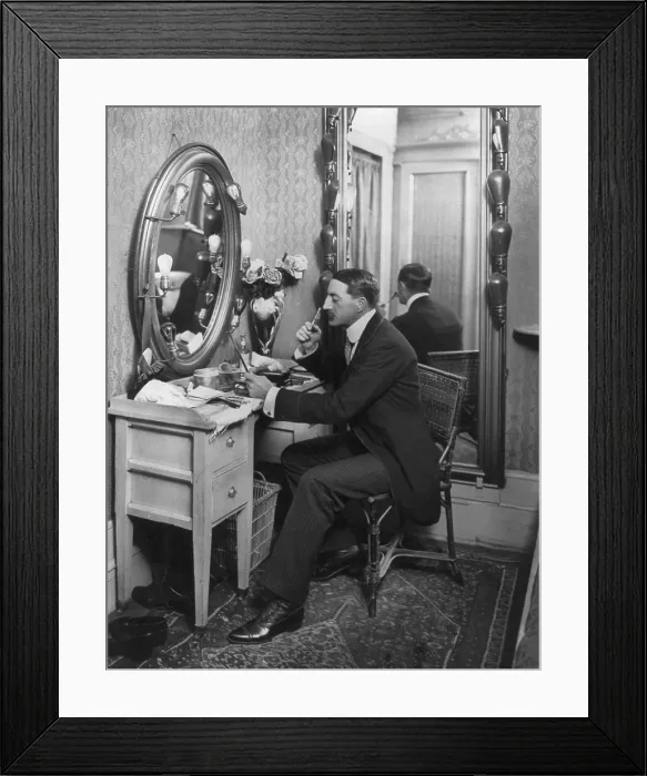 Framed Print : John Drew (1853-1927), American actor, seated at dressing table, in Empire Theatre, New York, 1902