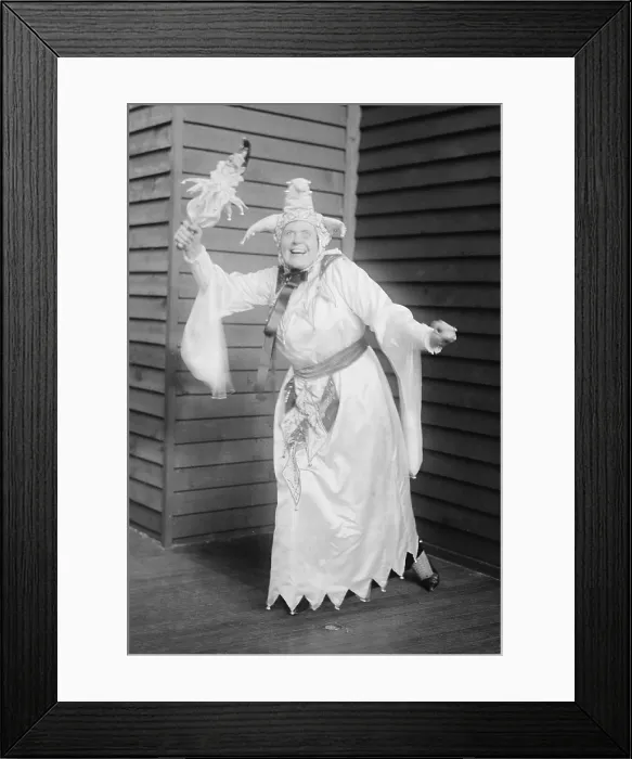 Framed Print : Marie Dressler (1868-1934), Canadian born comedienne, posing as a jester. Ca. 1910 Framed Print : Marie Dressler (1868-1934), Canadian born comedienne, posing as a jester. Ca. 1910
