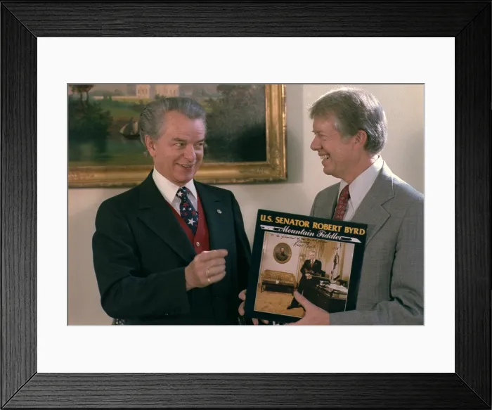 Framed Print : Senator Robert Byrd 1917-1910 presenting President Jimmy Carter a copy of his record album MOUNTAIN FIDDLER. Ca. 1978