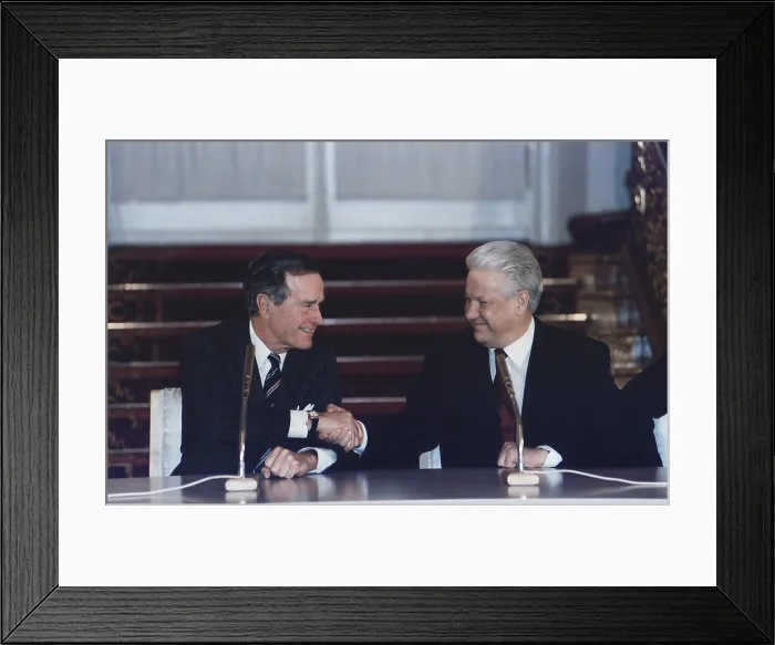 Framed Print : President George H. W. Bush and Russian President Boris Yeltsin sign the Start II Treaty in Vladimir Hall The Kremlin in Moscow Russia. Jan. 3 1993 Framed Print : President George H. W. Bush and Russian President Boris Yeltsin sign the Start II Treaty in Vladimir Hall The Kremlin in Moscow Russia. Jan. 3 1993