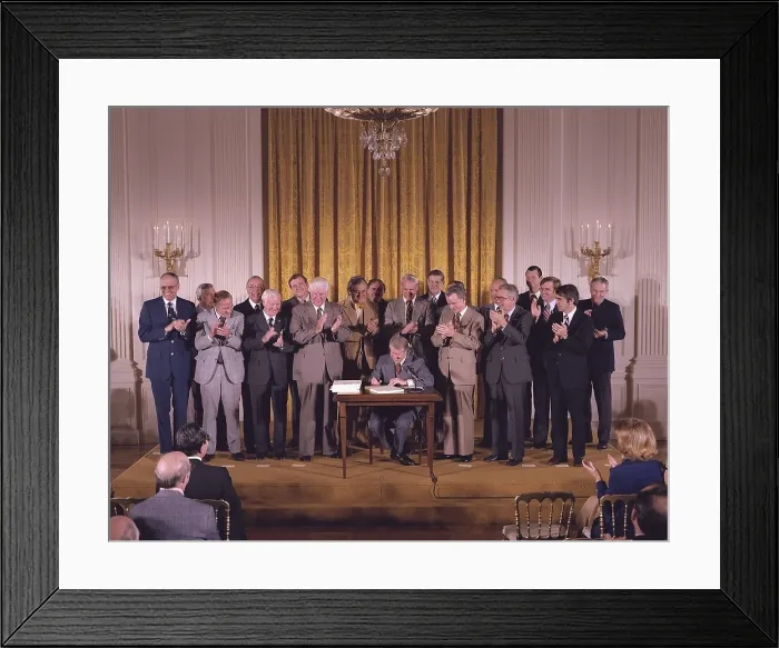 Framed Print : Jimmy Carter signs the National Energy Act which promoted fuel efficiency and renewable energy through taxes and tax credits. Secretary of Energy James Schlesinger b