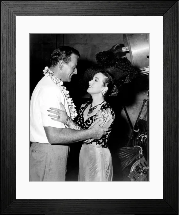 Framed Print : DONOVAN'S REEF, from left, John Wayne, Dorothy Lamour, on-set, 1963 Framed Print : DONOVAN'S REEF, from left, John Wayne, Dorothy Lamour, on-set, 1963