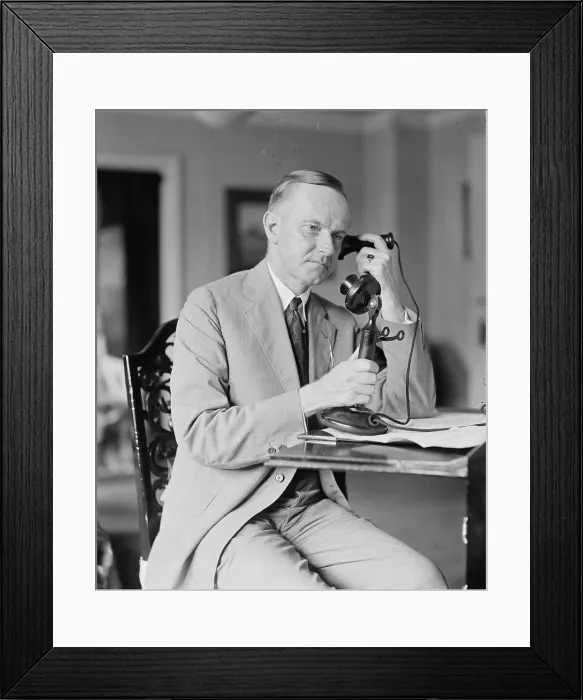 Framed Print : President Calvin Coolidge (1872-33) using a telephone, two days after the sudden death of President Warren Harding on Aug. 2, 1923