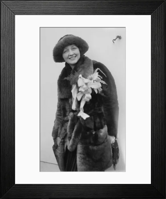 Framed Print : Hedda Hopper (1890-1966), as a young actress, wearing a fur coat with matching hat. Ca. 1925