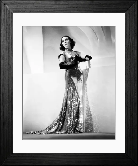 Framed Print : INTERNATIONAL SETTLEMENT, (aka SHANGHAI DEADLINE), Dolores del Rio, in a copper-sequin dress by Herschel McCoy, 1938, TM and Copyright 20th Century-Fox Film Corp