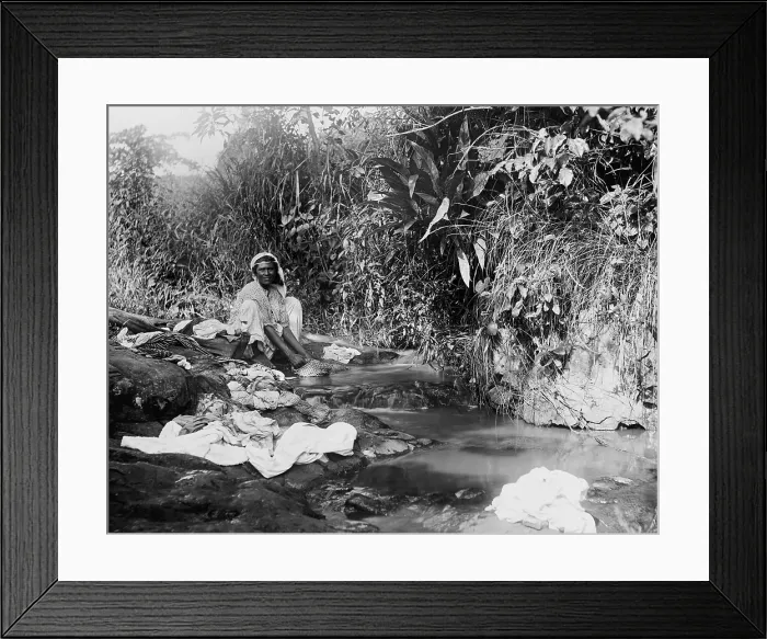 Framed Print : Puerto Ricans women washing laundry in an open stream shortly after Puerto Rico was annexed by the United States after the Spanish American war. Ca. 1903